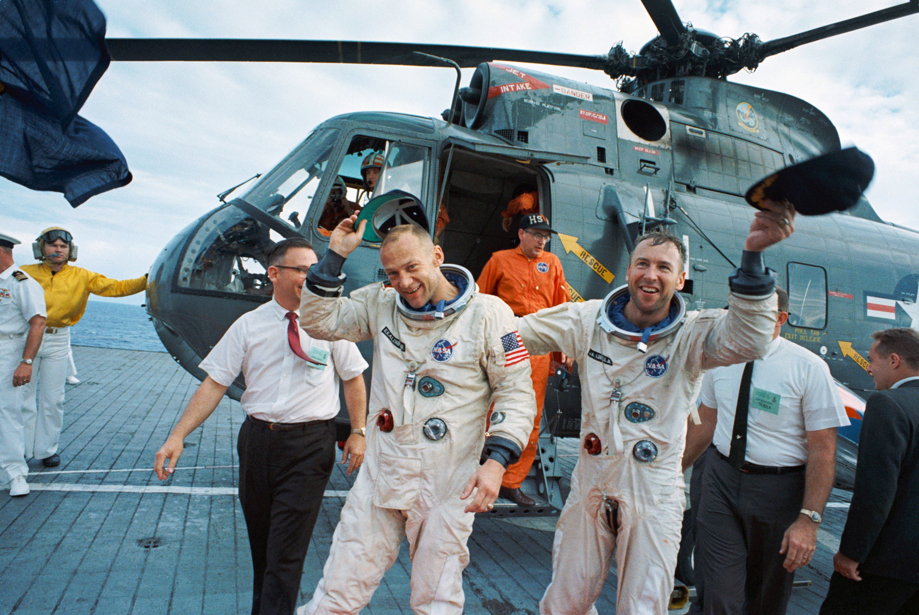 Aldrin and Jim Lovell arrive on the aircraft carrier USS Wasp (CV-18) after the Gemini-12 mission.