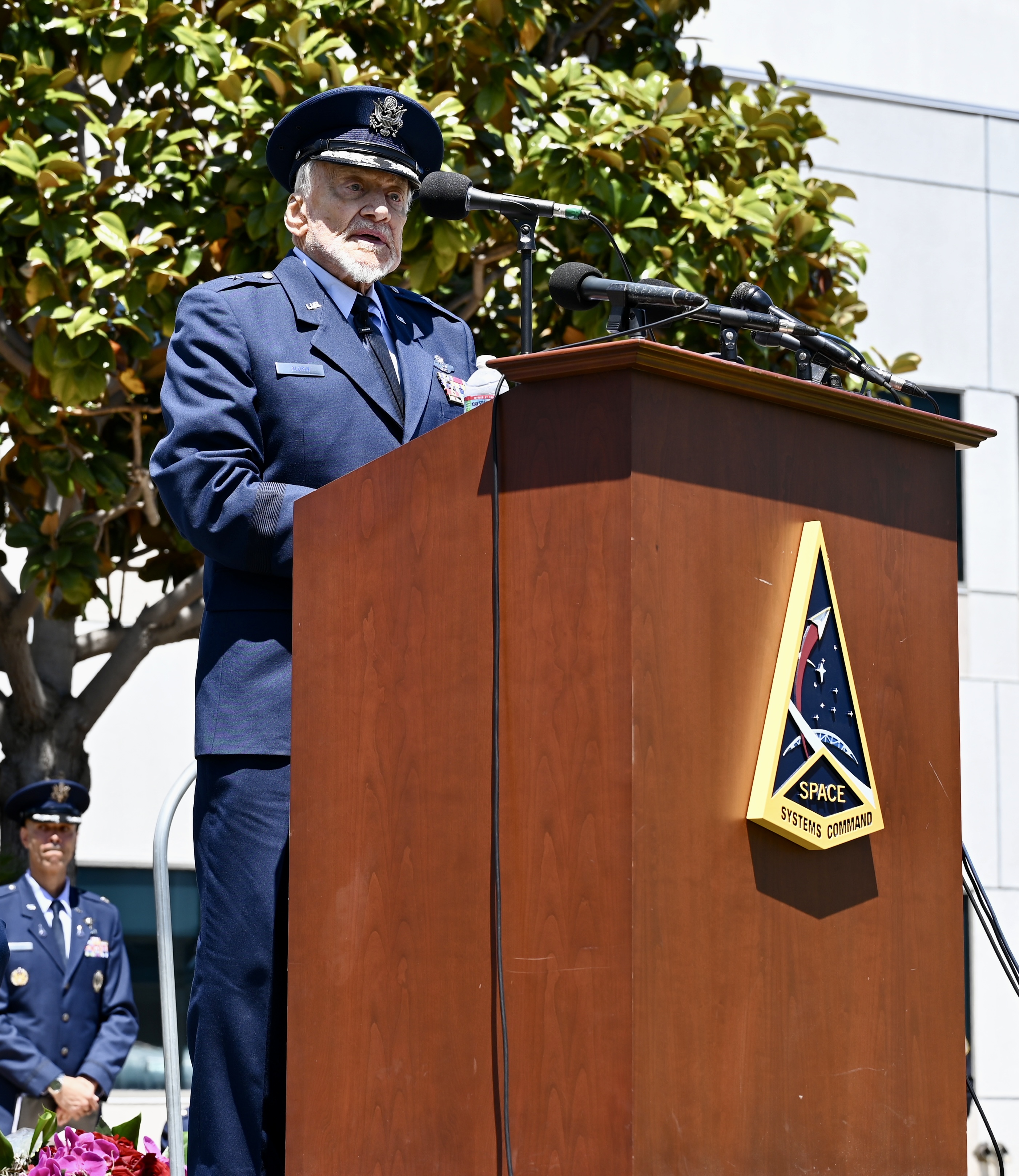 Aldrin addresses the crowd during the ceremony for his honorary promotion to brigadier general.