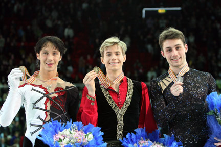 Buttle (center) with other medalists at the 2008 World Championships