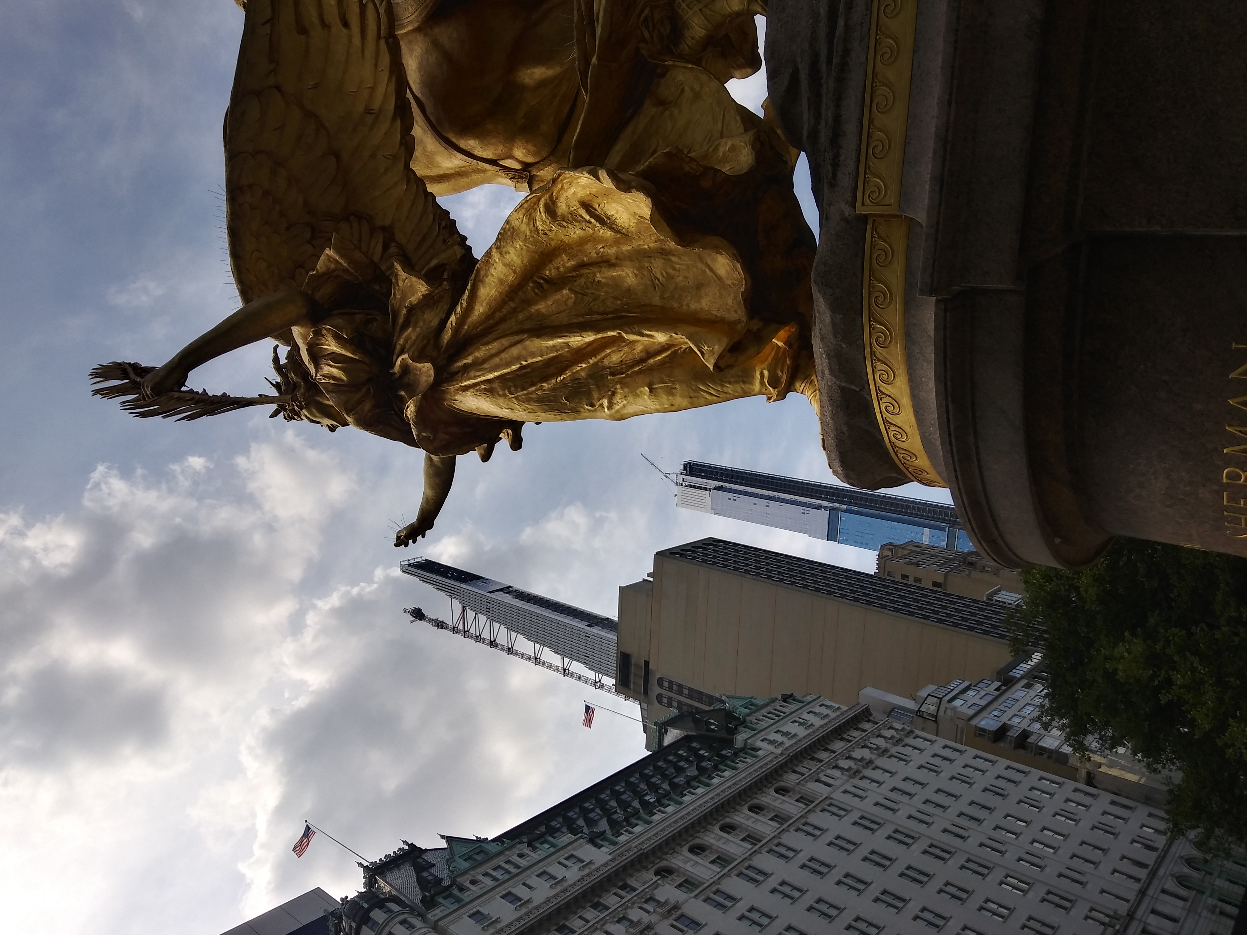 The goddess Nike on the Sherman Monument reaching toward Central Park South, August 2020