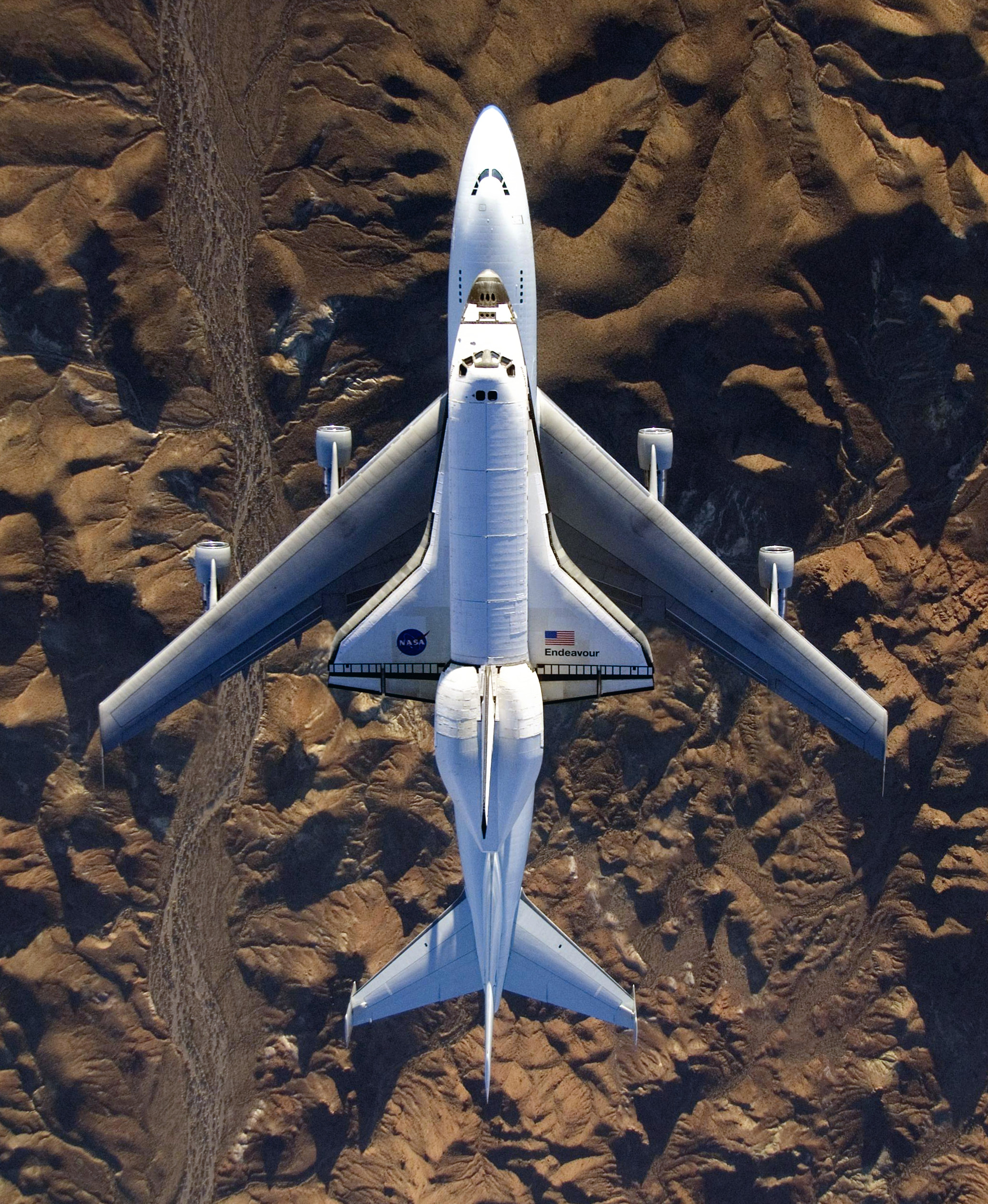STS-126 The Space Shuttle Endeavour mounted atop its modified Boeing 747 carrier aircraft flies over California's Mojave Desert on its way back to the Kennedy Space Center in Florida on Dec 10, 2008.
