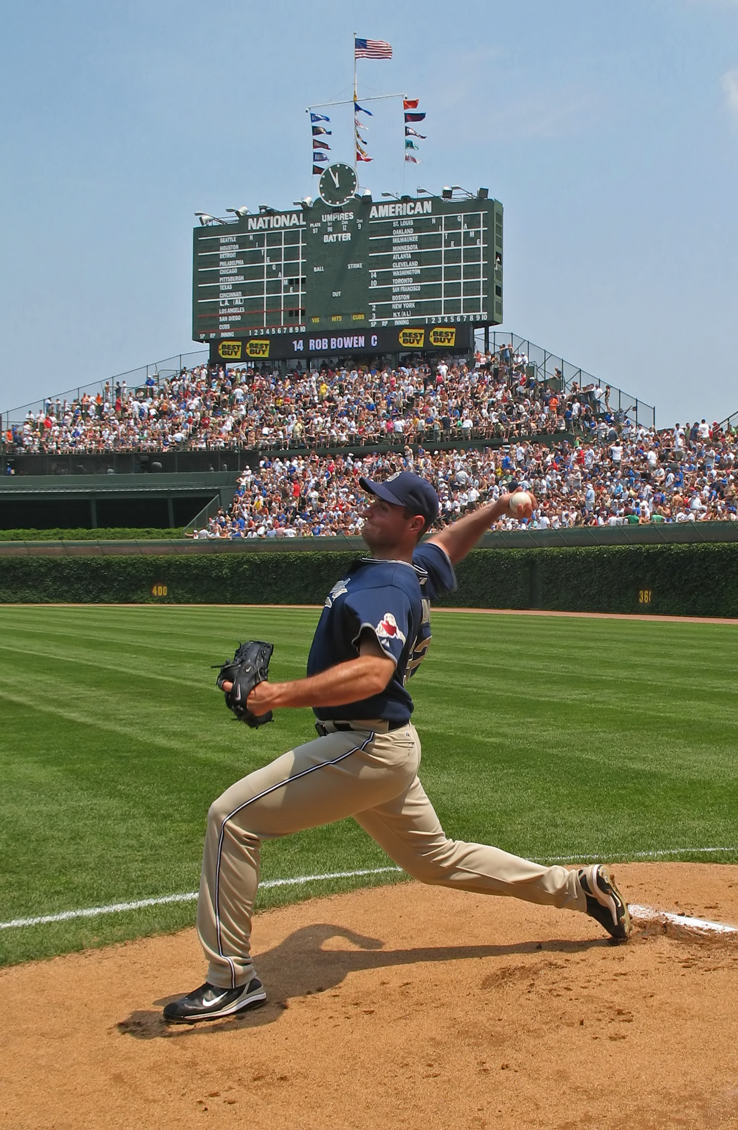 Young throwing a four-seam fastball during pregame warmup at Wrigley Field in Chicago.