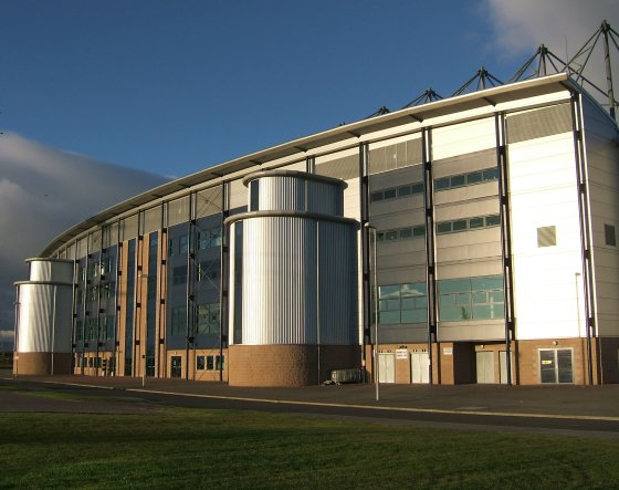 The front façade of a stadium building
