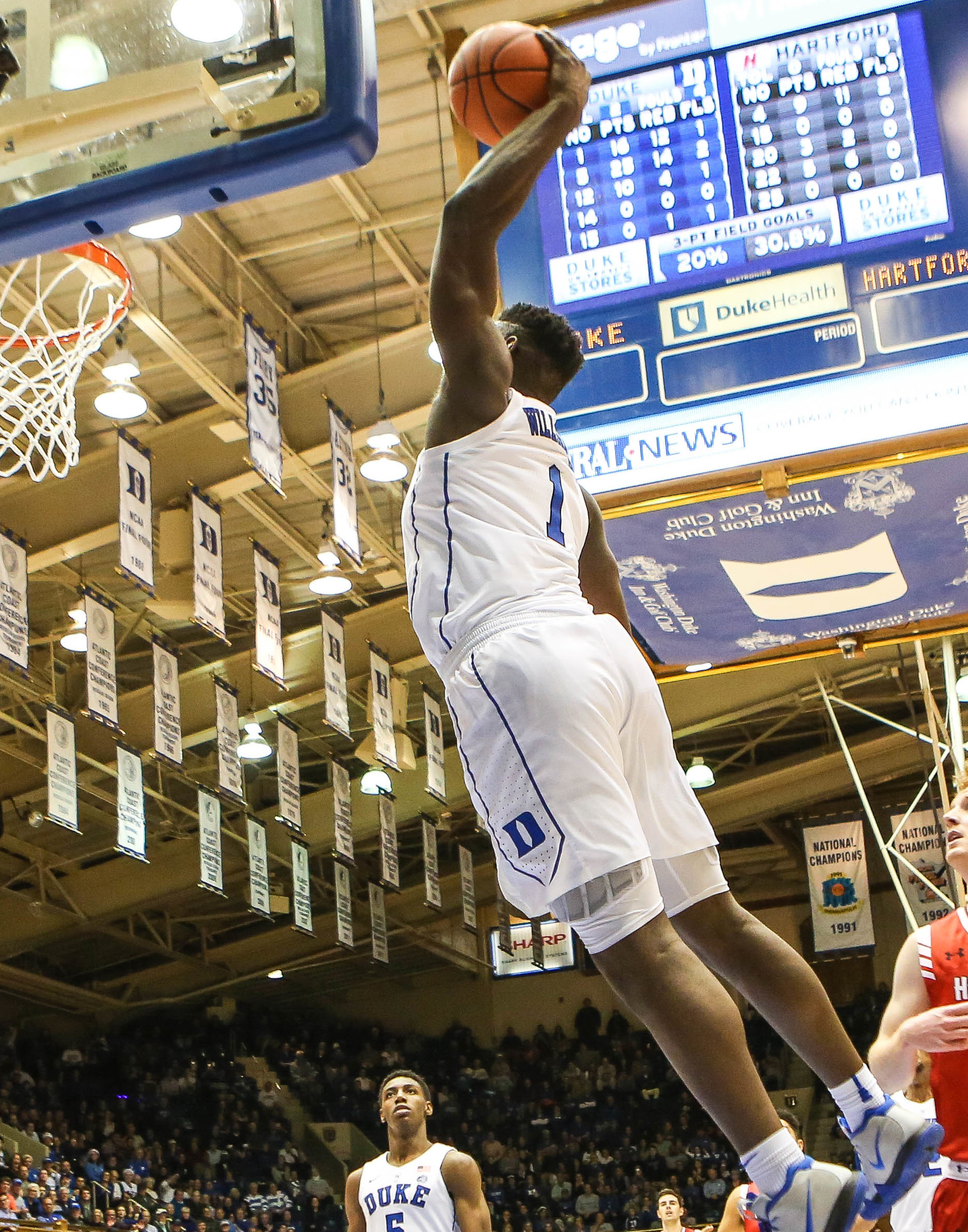 Williamson goes in for a slam dunk against Hartford in December 2018.