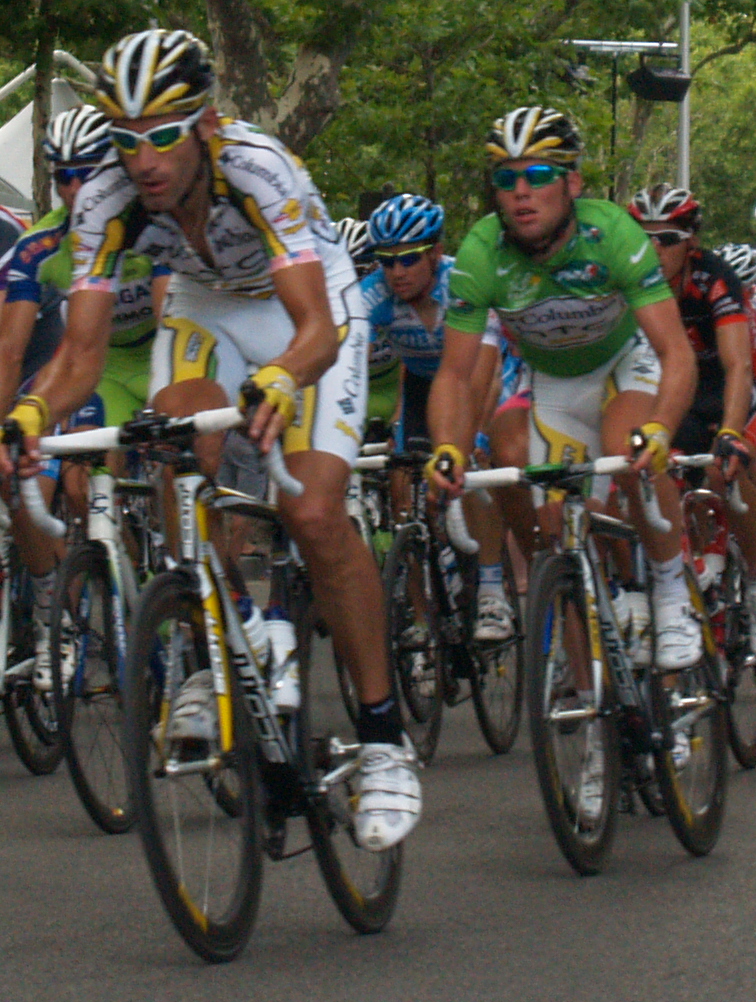 A group of cyclists on a road 