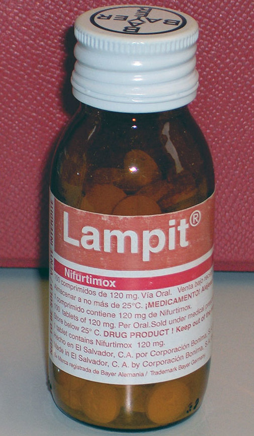 A brown glass bottle of pills, labeled 