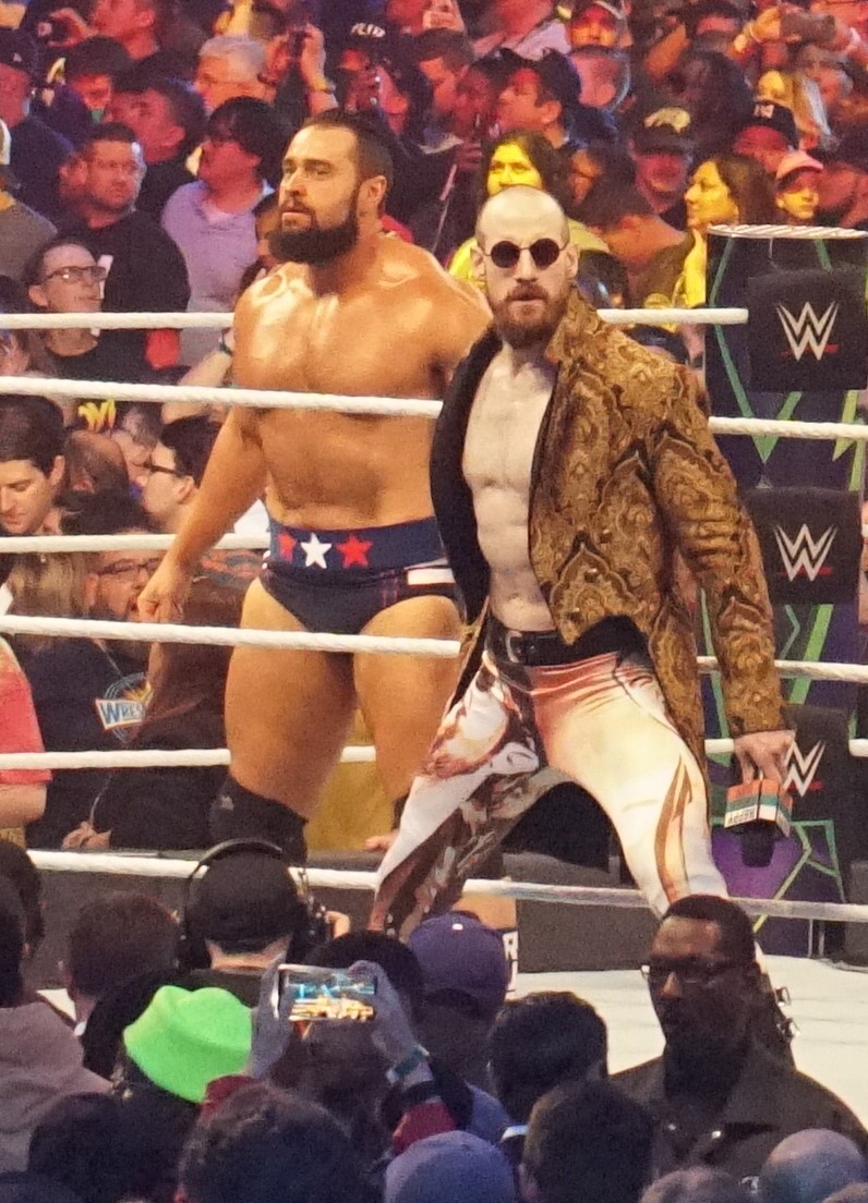 English (kanan) bersama Rusev di WrestleMania 34
