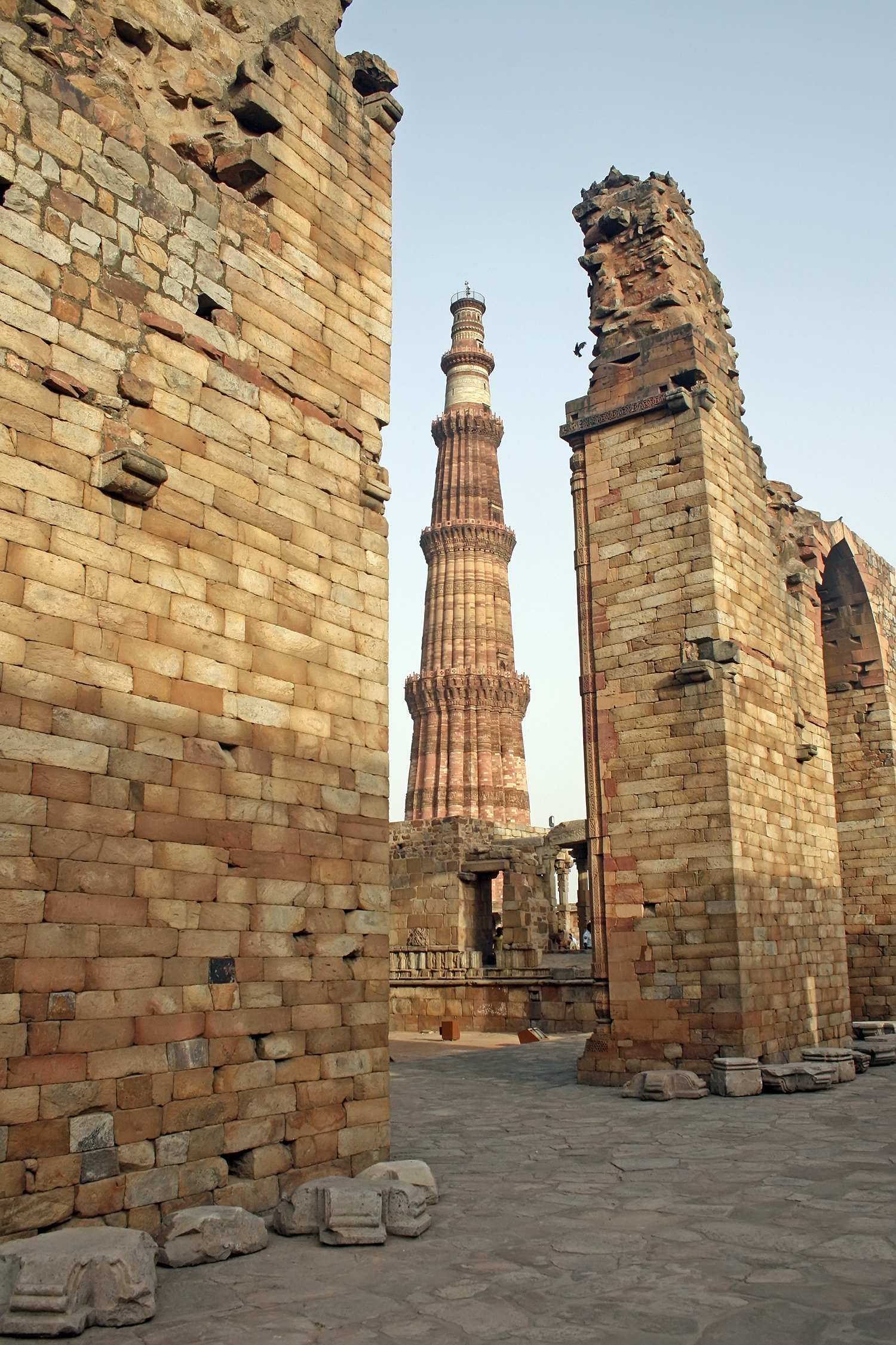 The Qutb Minar, 240 ft (73 m) tall, completed by the Sultan of Delhi, Iltutmish, representing Indo-Islamic architecture.