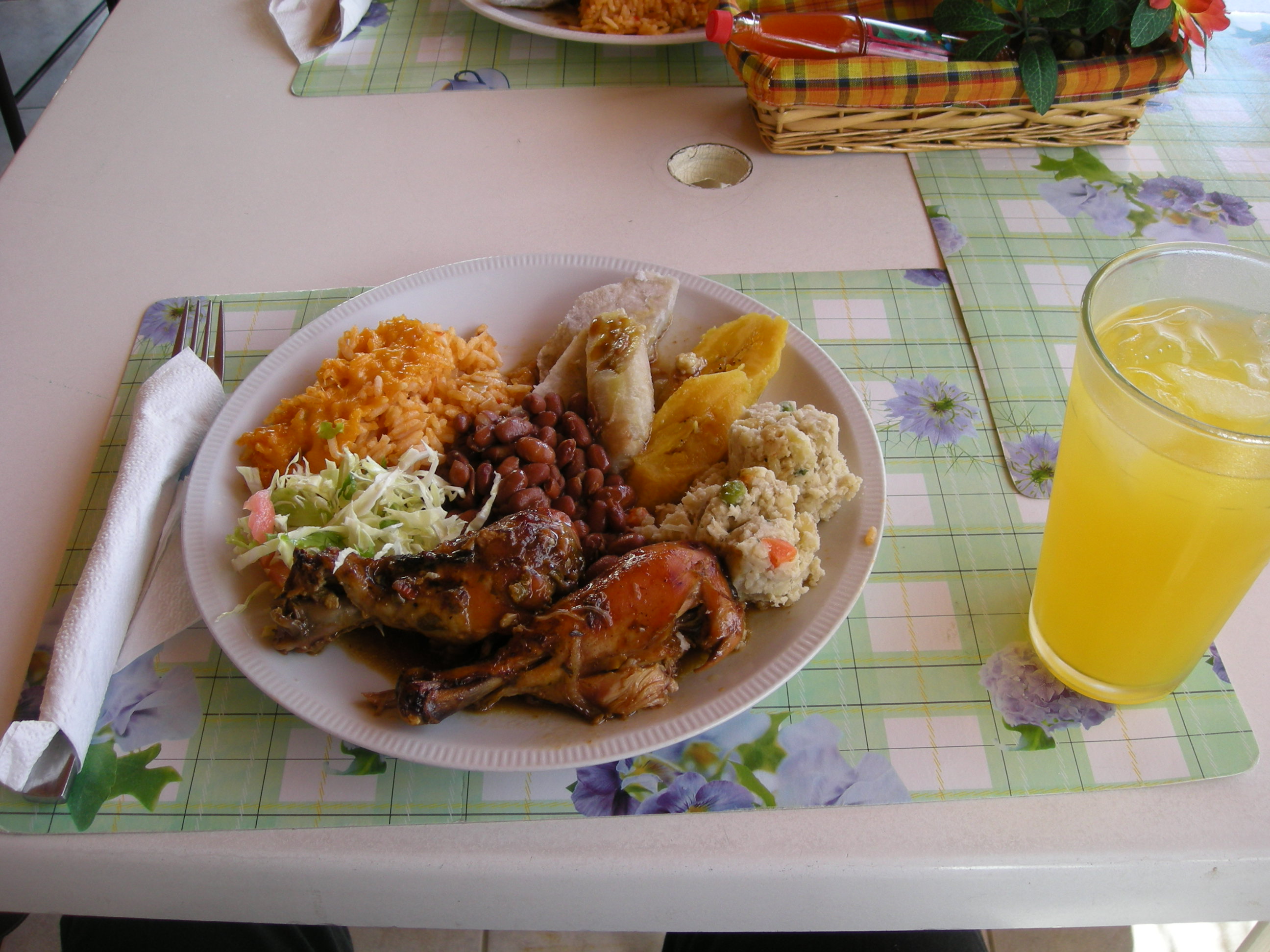 A typical Creole lunch in Dominica, showcasing the island's flavorful cuisine that blends African, European, and local influences.