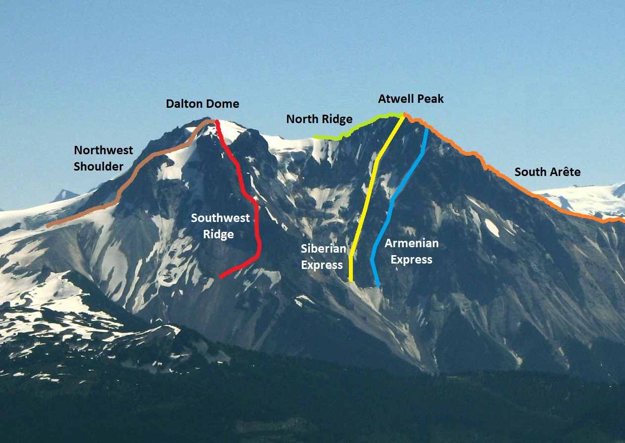 A dark, lightly snowed mountain with two summits and coloured lines depicting paths by which the mountain can be climbed.