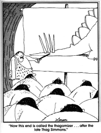 A cartoon of a group of cavemen. One points at a diagram of a dinosaur's tail with four spikes. The caption reads, 