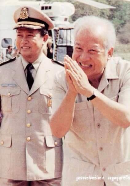 Ranariddh (left) on an inspection tour with Norodom Sihanouk (right) in the 1980s.