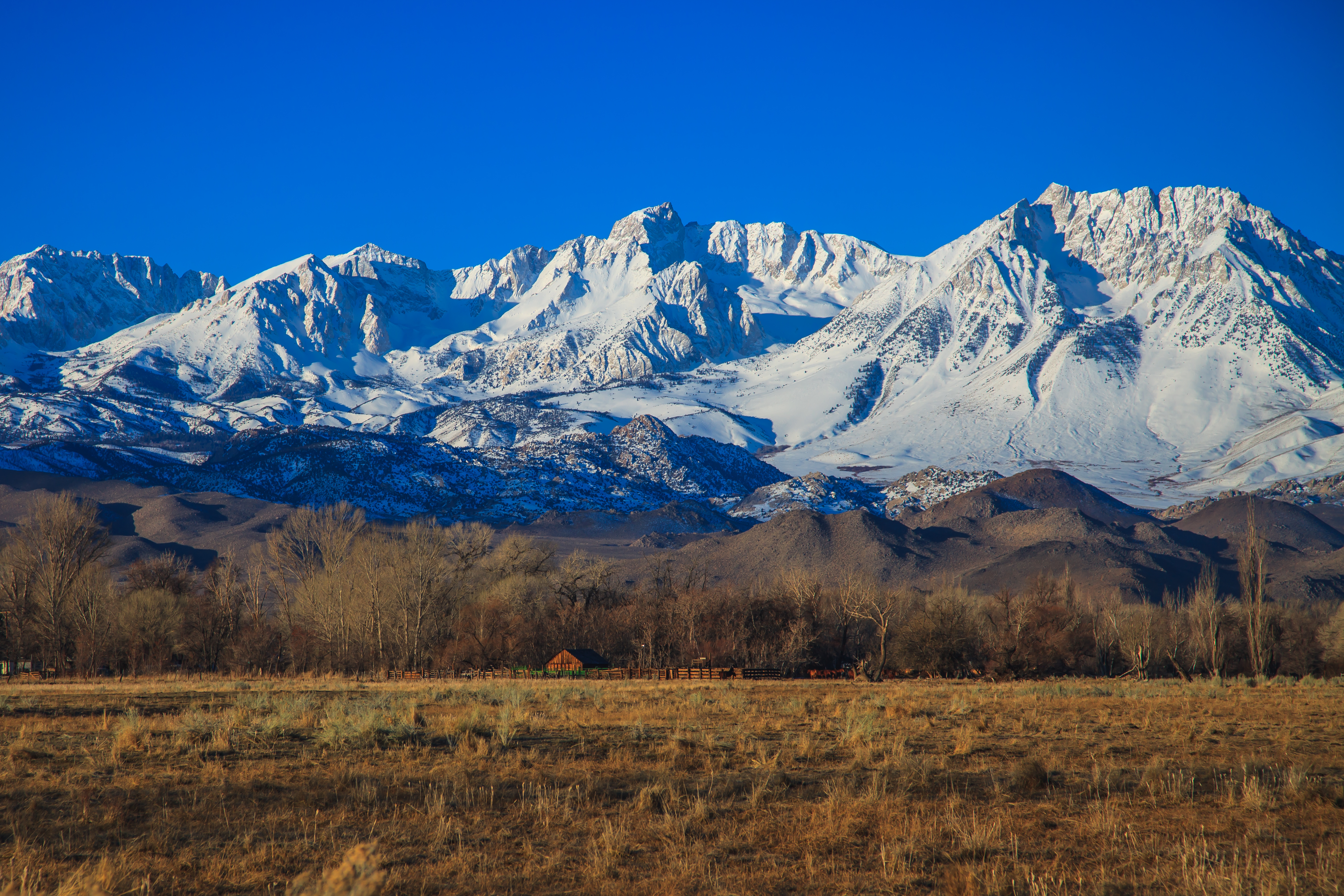 Snow-covered Sierra Nevada Mountain Range viewed from Bishop, CA