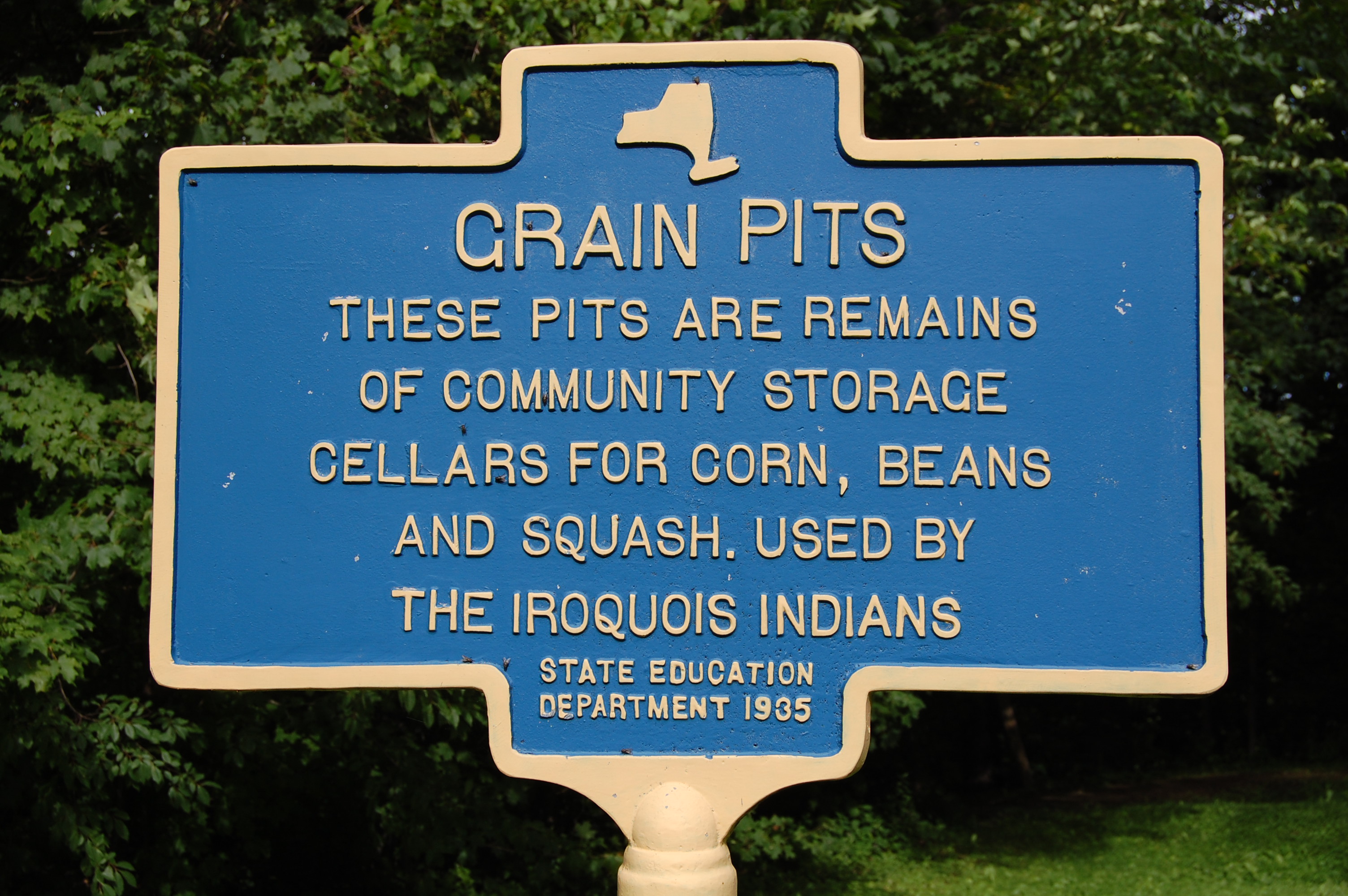 Sign with raised letters reading, 