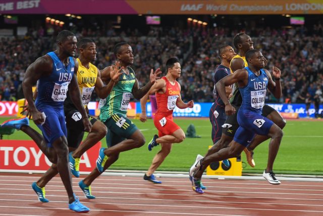 2017년 세계 선수권 대회 100m 결승에서 경주 중인 콜먼(오른쪽).