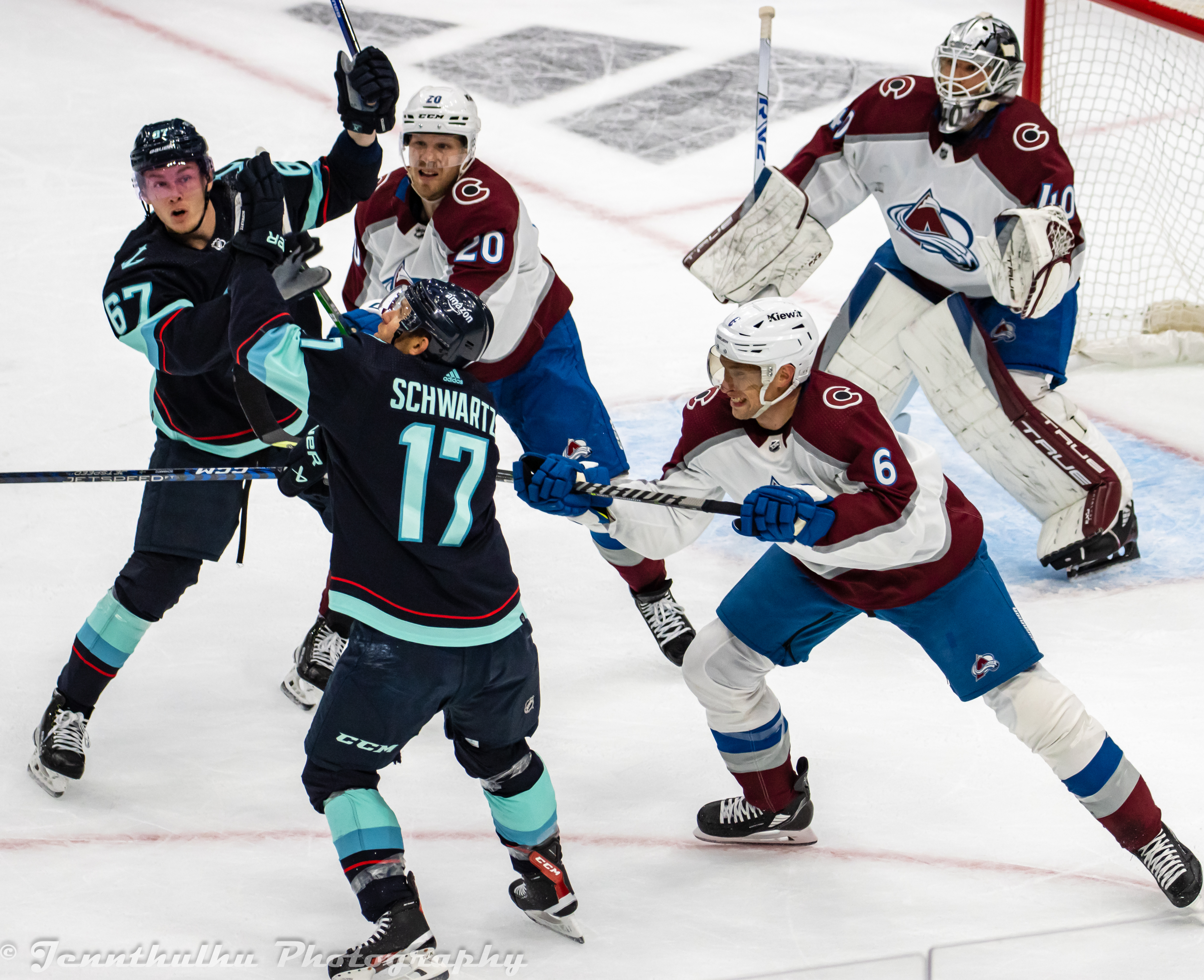Johnson defending against Jaden Schwartz and Morgan Geekie with teammates Lars Eller and Alexandar Georgiev in April 2023 during the first round of the 2023 Stanley Cup playoffs