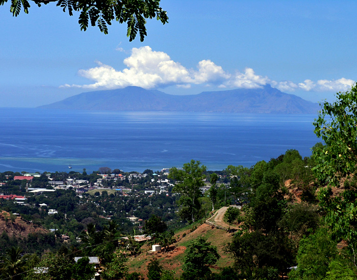 The capital city Dili with Atauro Island in the background; Dili serves as a center for contemporary arts and cultural expression.