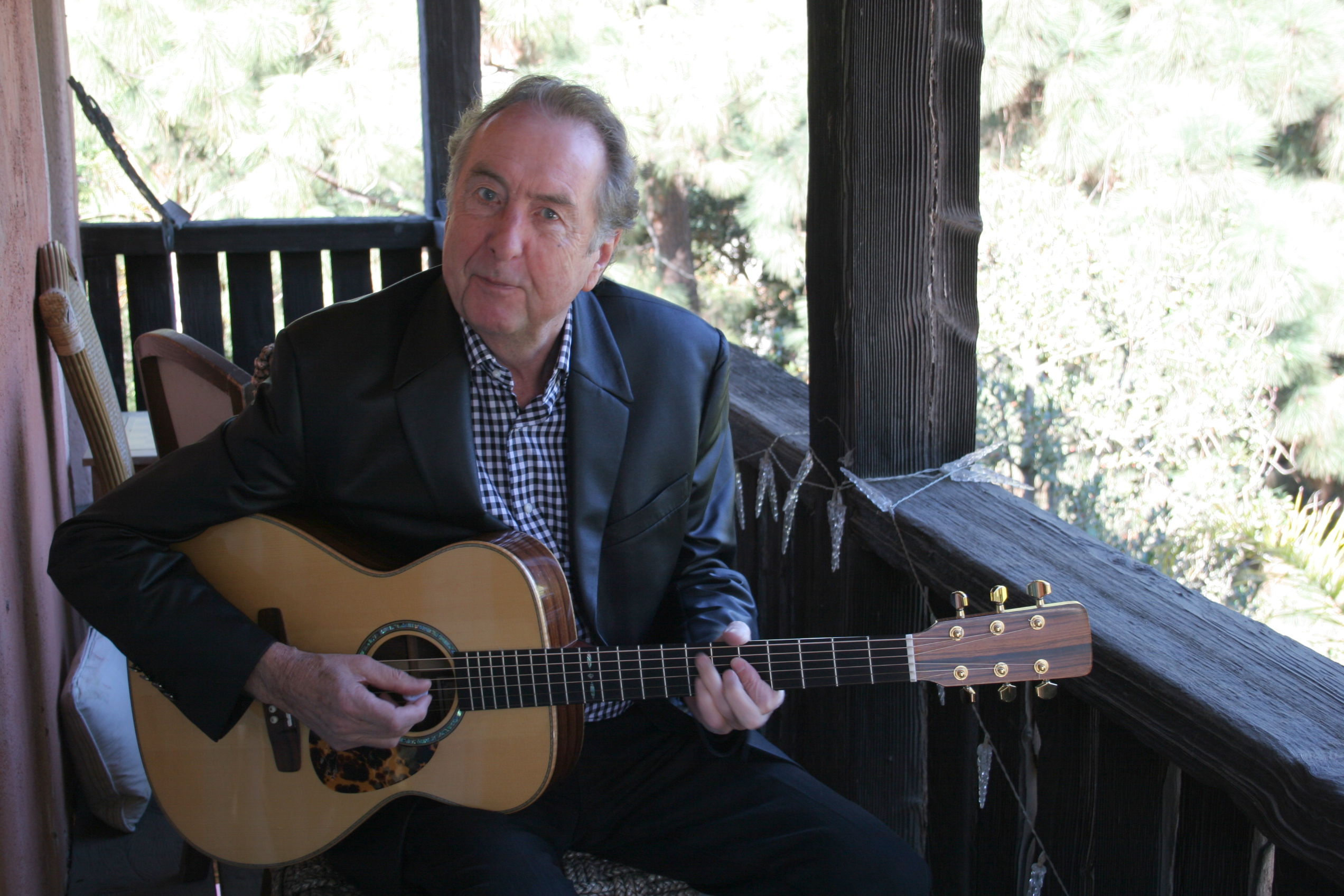 Idle with a guitar. He has been a musician since his Python days.