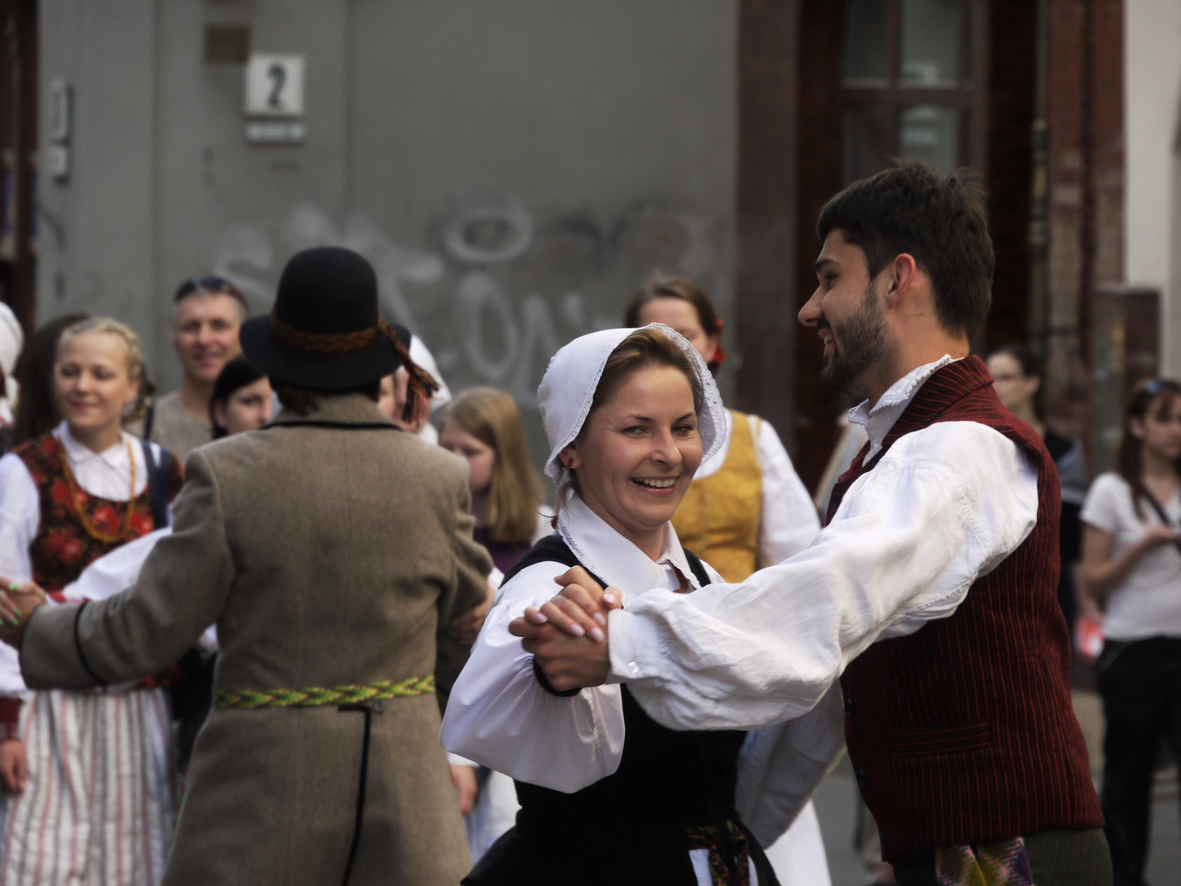 Lithuanians in traditional attire dancing at the Skamba skamba kankliai international folk music festival in Vilnius.