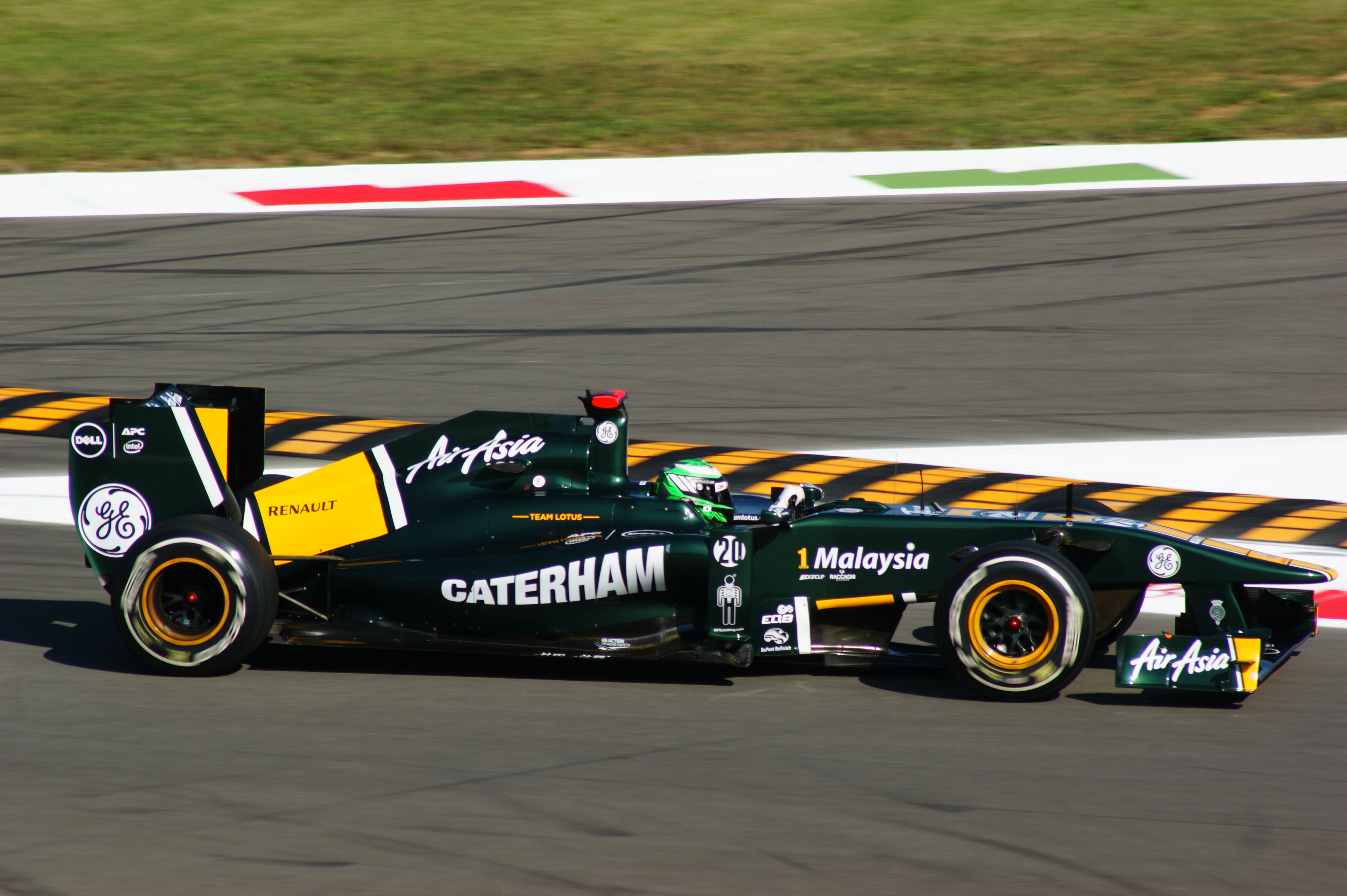 Kovalainen racing for Lotus at the 2011 Italian Grand Prix.