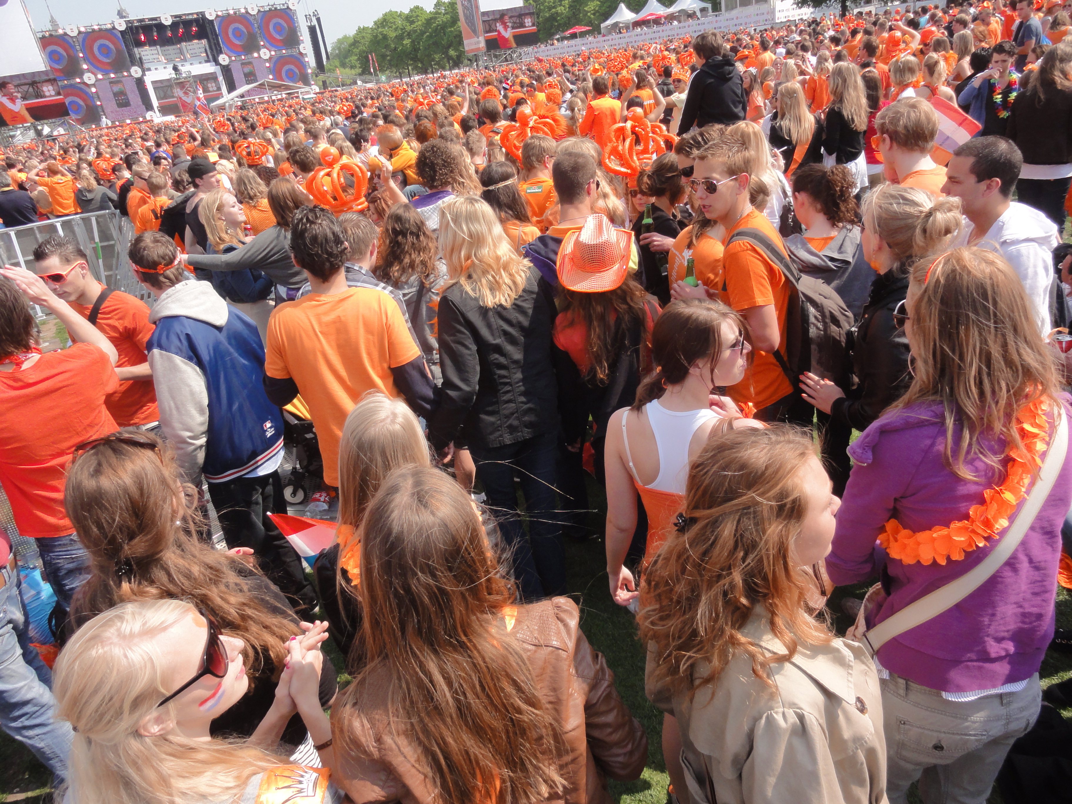 Dutch people in orange celebrating King's Day in Amsterdam, 2017 (before Willem-Alexander's ascension, it was Queen's Day)