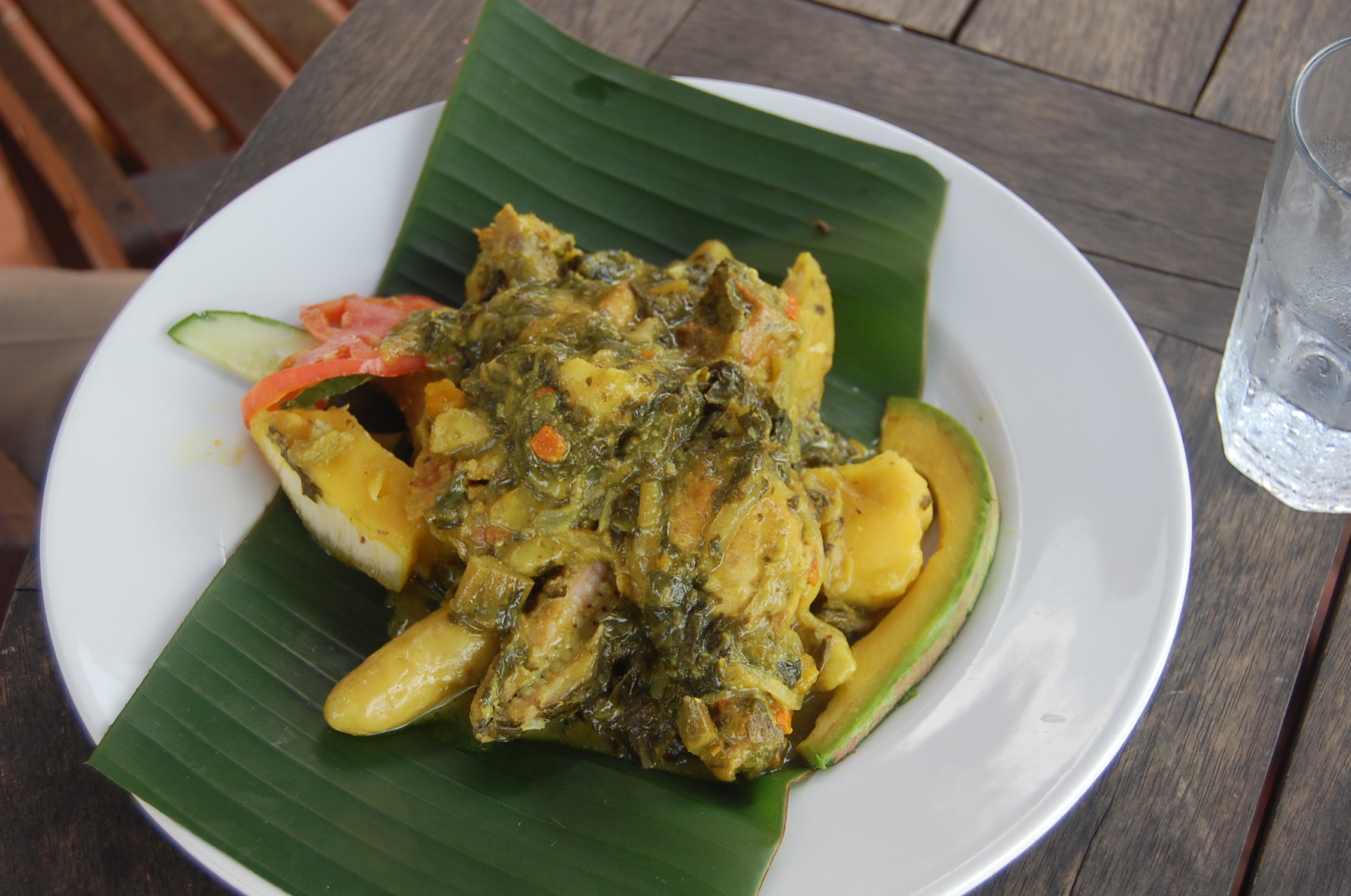 Preparing Oil down, the national dish