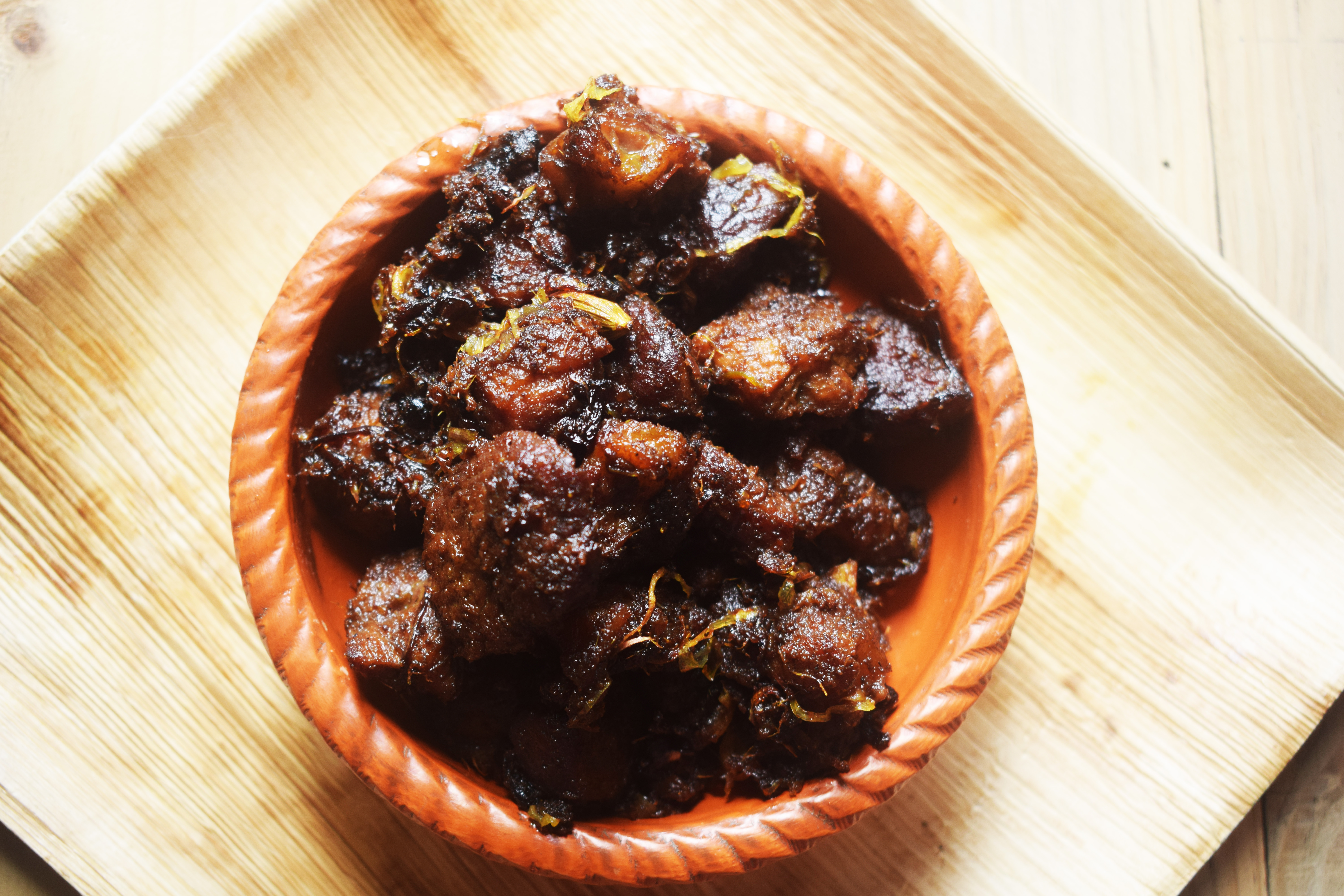 Kala bhuna, a popular spicy beef dish originating from the Chittagong region.