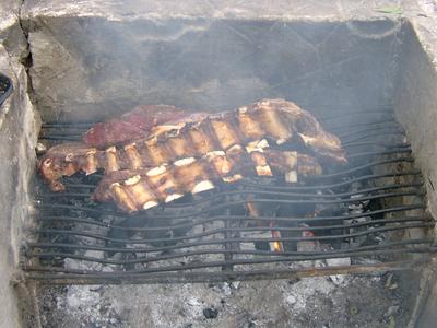 Asado (barbecue) is a central part of Uruguayan cuisine and social life.