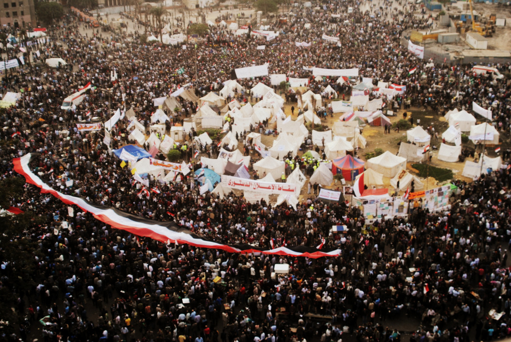 Protests in Tahrir Square against President Mohamed Morsi on November 27, 2012, highlighting the political polarization and ongoing struggle for democratic governance following the revolution.