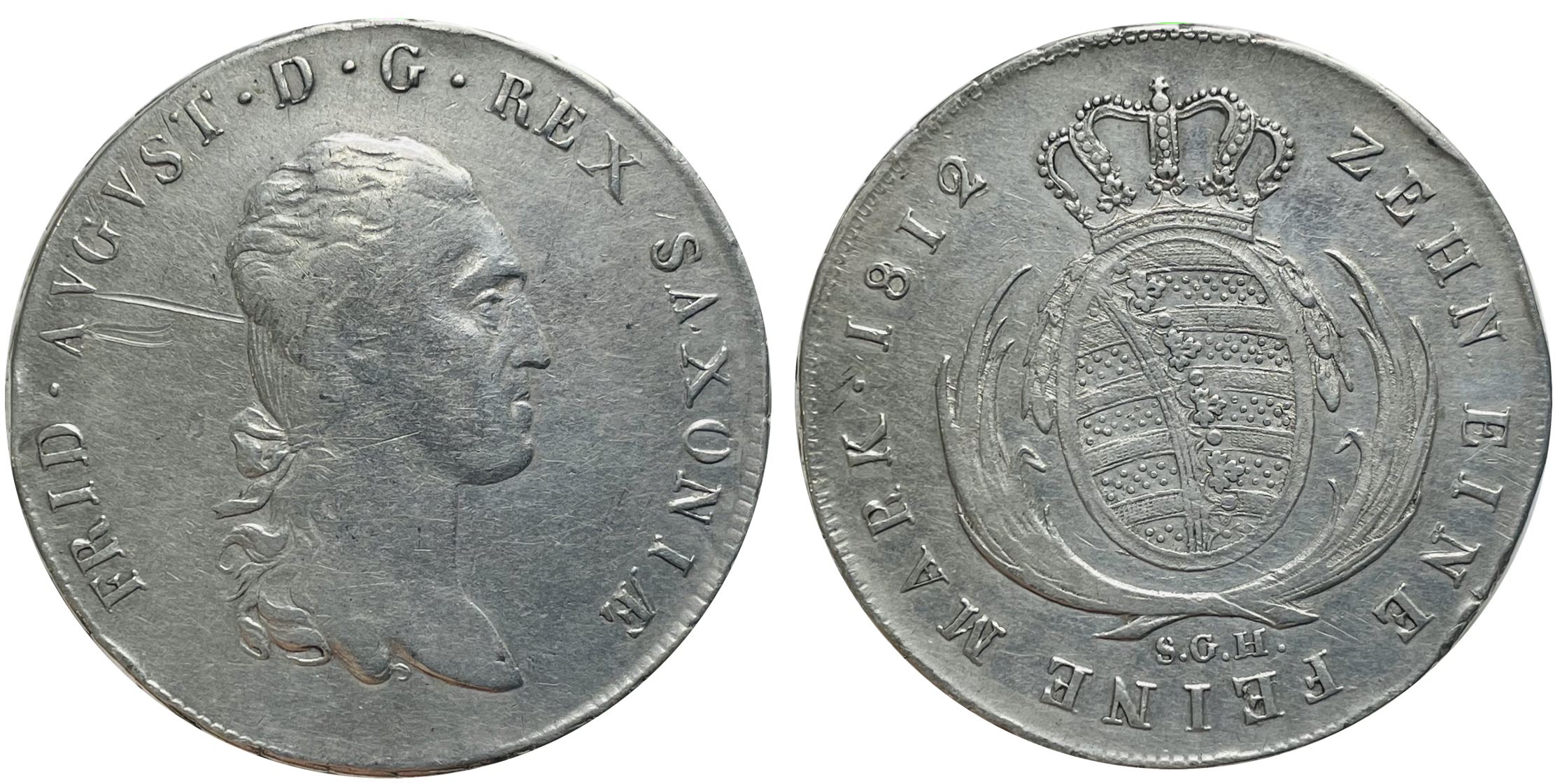 A 1 conventionsthaler silver coin from the Kingdom of Saxony, 1812, featuring Frederick Augustus I as King.