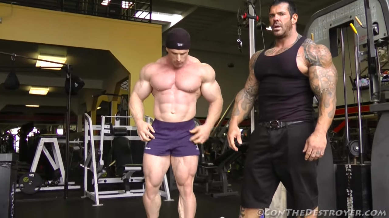 Rich Piana posing on stage.