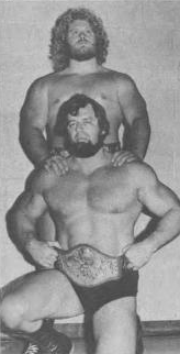 Lumberjack Eric (trên) và Lumberjack Pierre (dưới) với Đai vô địch Đội tag team Thế giới WWWF, khoảng năm 1978.