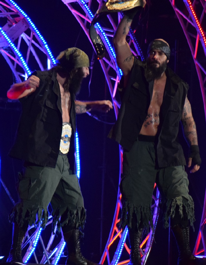 The Briscoes as two thirds of the NEVER Openweight 6-Man Tag Team Champions