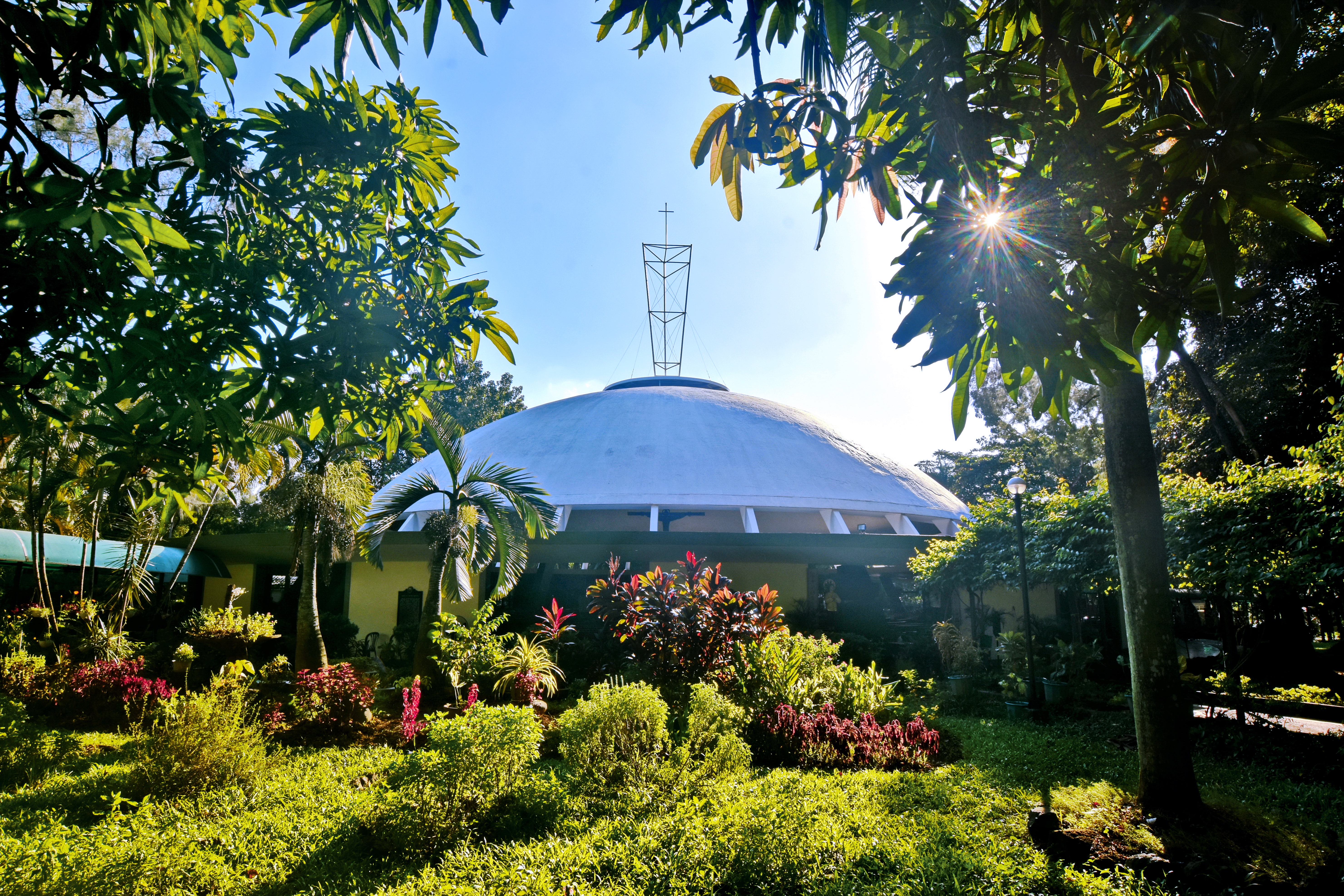 The Church of the Holy Sacrifice in the University of the Philippines Diliman was Locsin's first constructed building, notable as the first circular church and first thin-shell concrete dome in the Philippines.