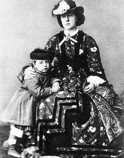 Queen Marie Henriette and her son, Prince Léopold, Duke of Brabant.