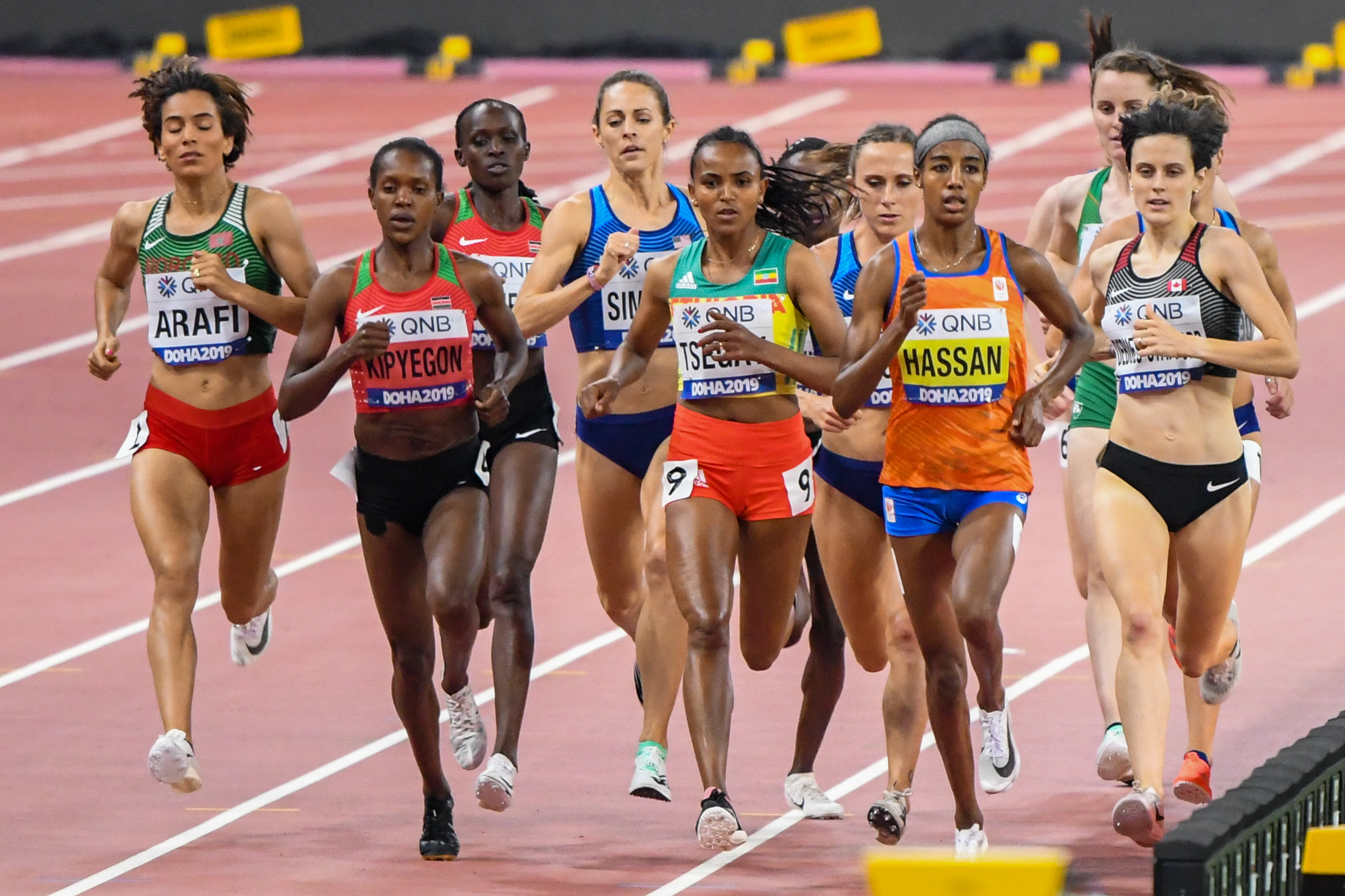 Gudaf (right, in yellow) competing in the 1500m final at the 2019 World Athletics Championships in Doha.
