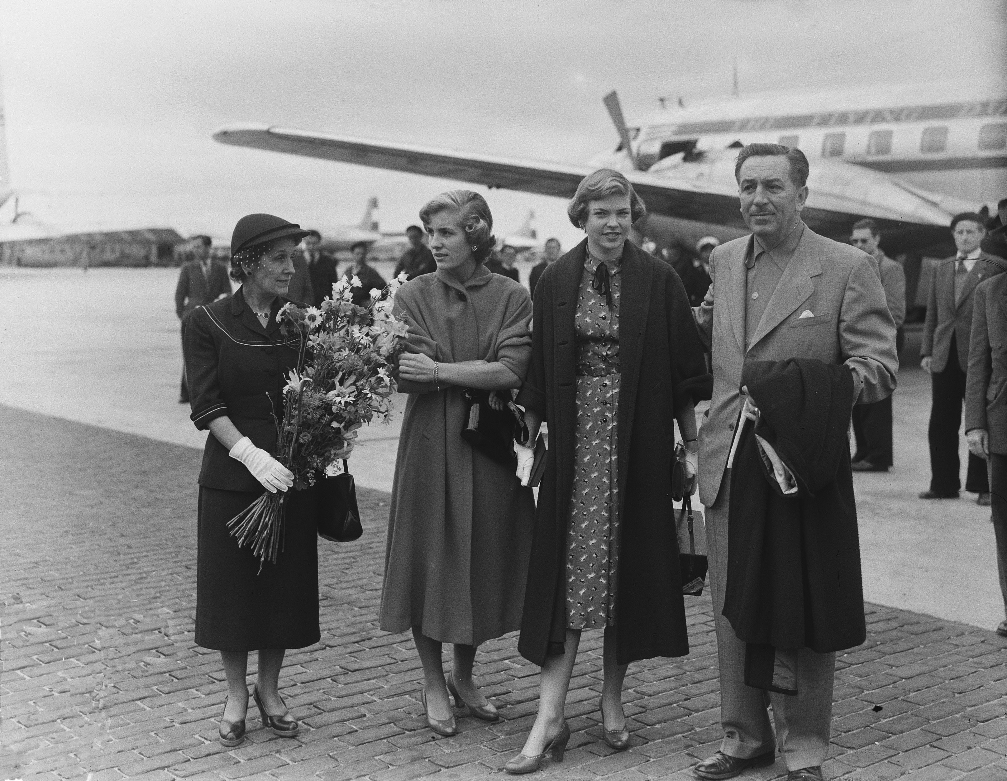 The Disney family at Amsterdam Airport Schiphol in 1951, showing Walt, Lillian, and Diane Disney.