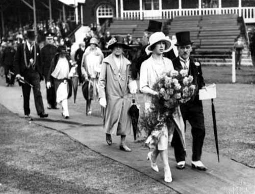 Princess Mary leading dignitaries in Headingley, Leeds, in 1927. Olive Middleton, great-grandmother of Catherine, Princess of Wales, is visible in a white hat.