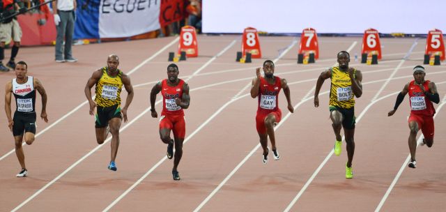 2015년 베이징 세계 선수권 대회 남자 100m 결승에서 경쟁하는 선수들